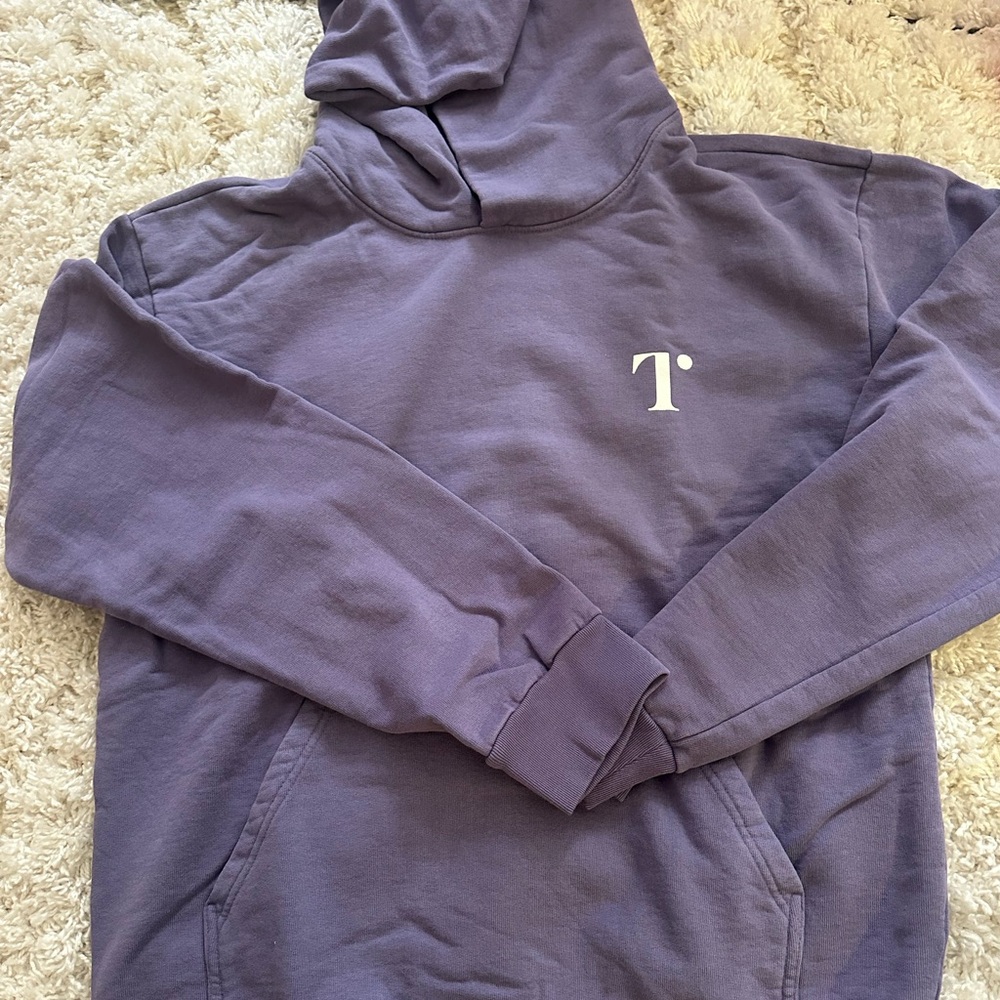 Brand new women’s Elizabeth Taylor purple hoodie.
